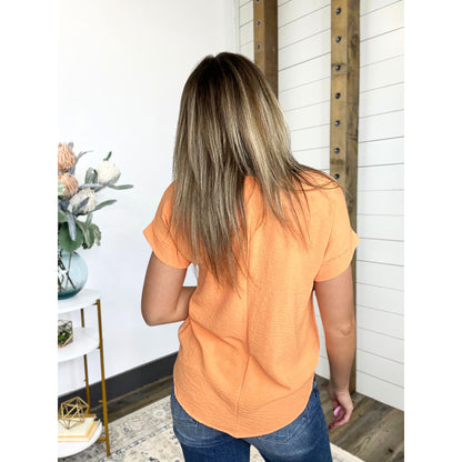Short Permanent Rolled Sleeve Scoop Neck Blouse