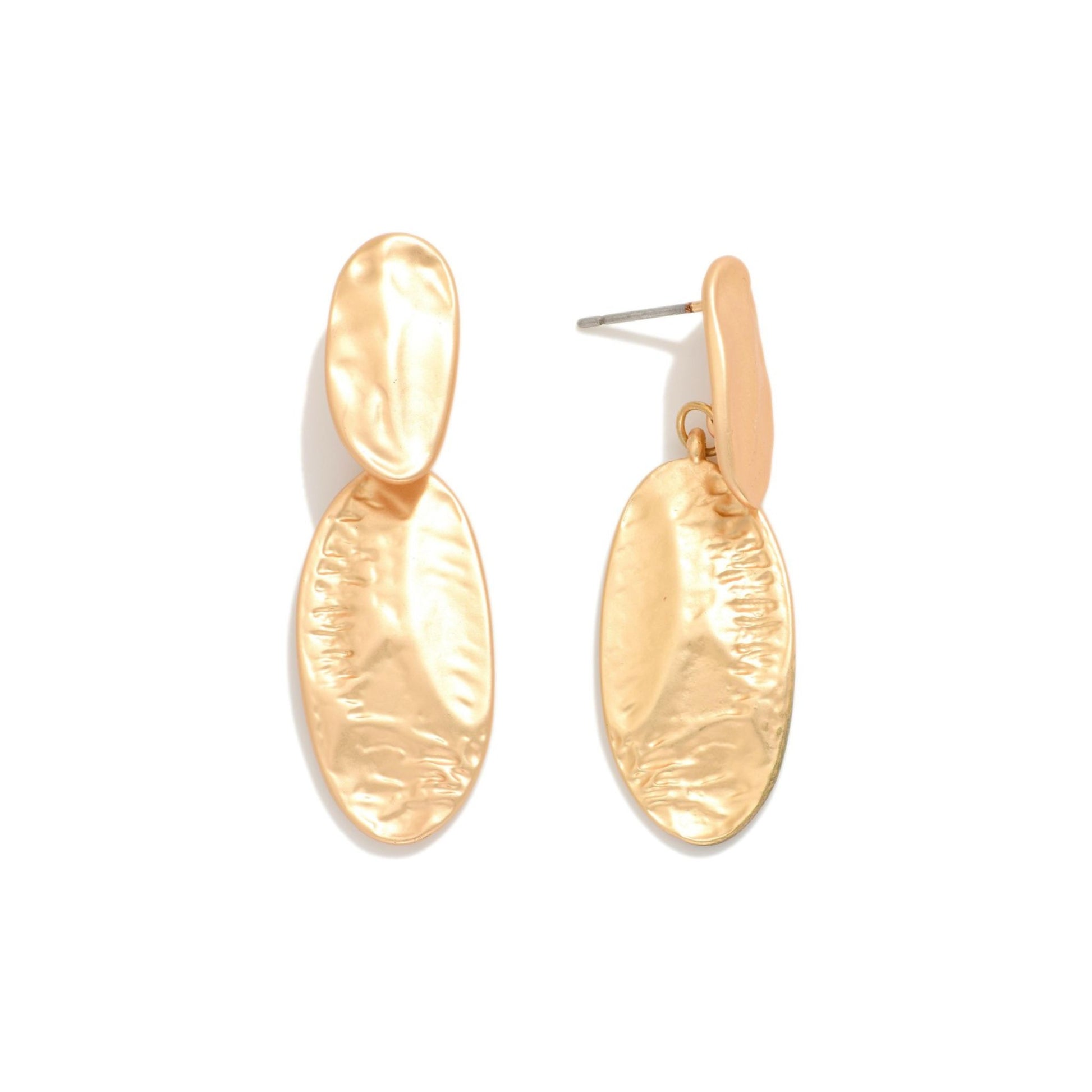 Gold earrings on a white background